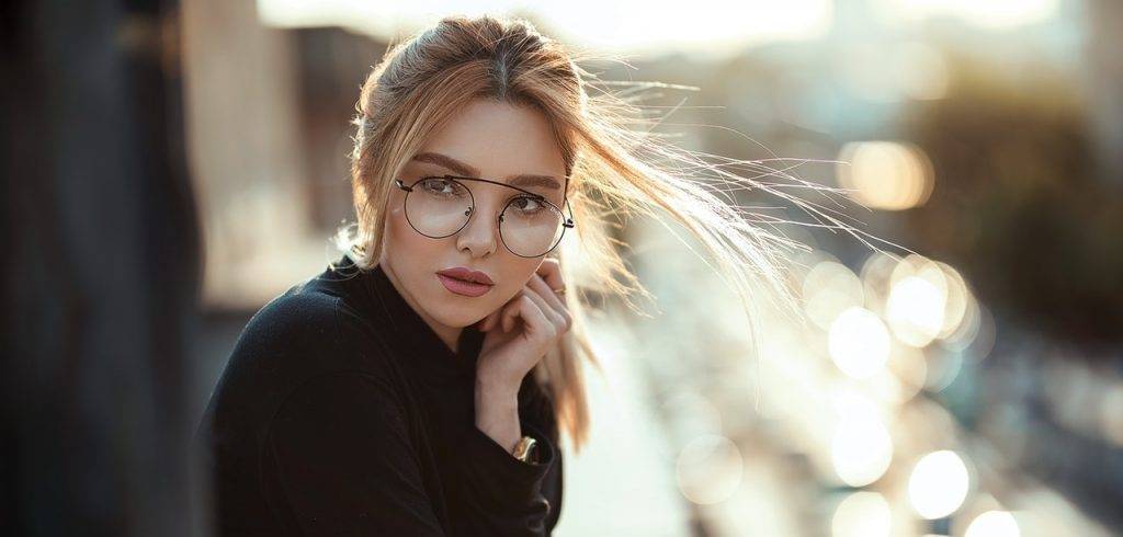 Woman wearing eyeglasses in Tesla City, Tesla State